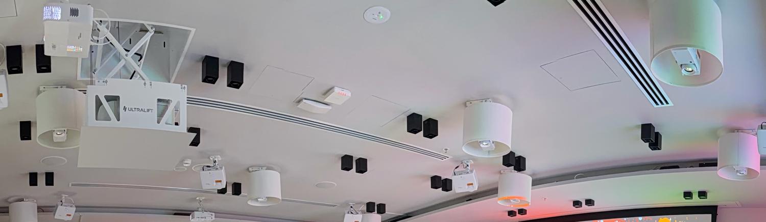 Projectors, speakers and a motorised projector lift built into the ceiling